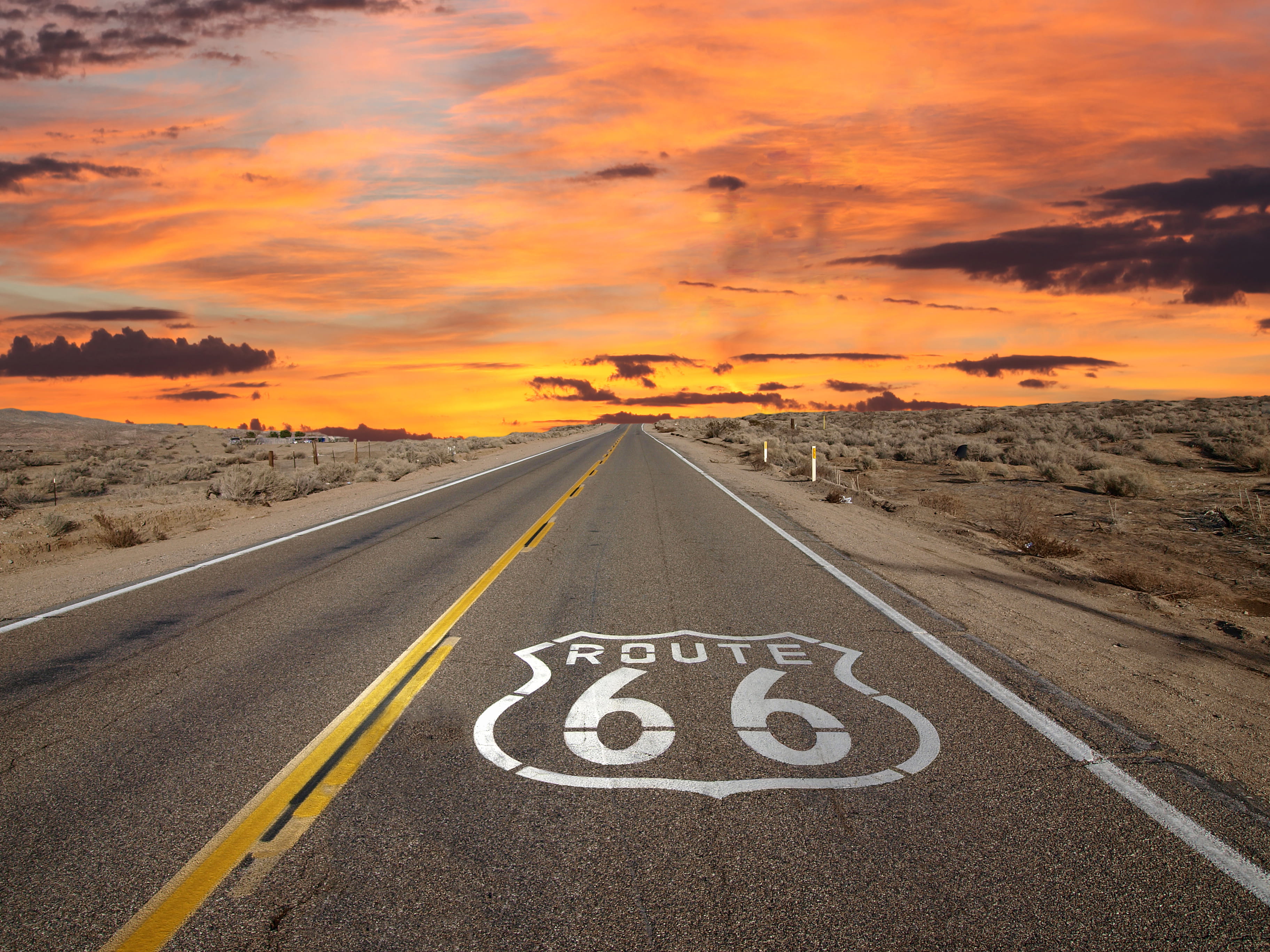 Route 66 desert road with sunset